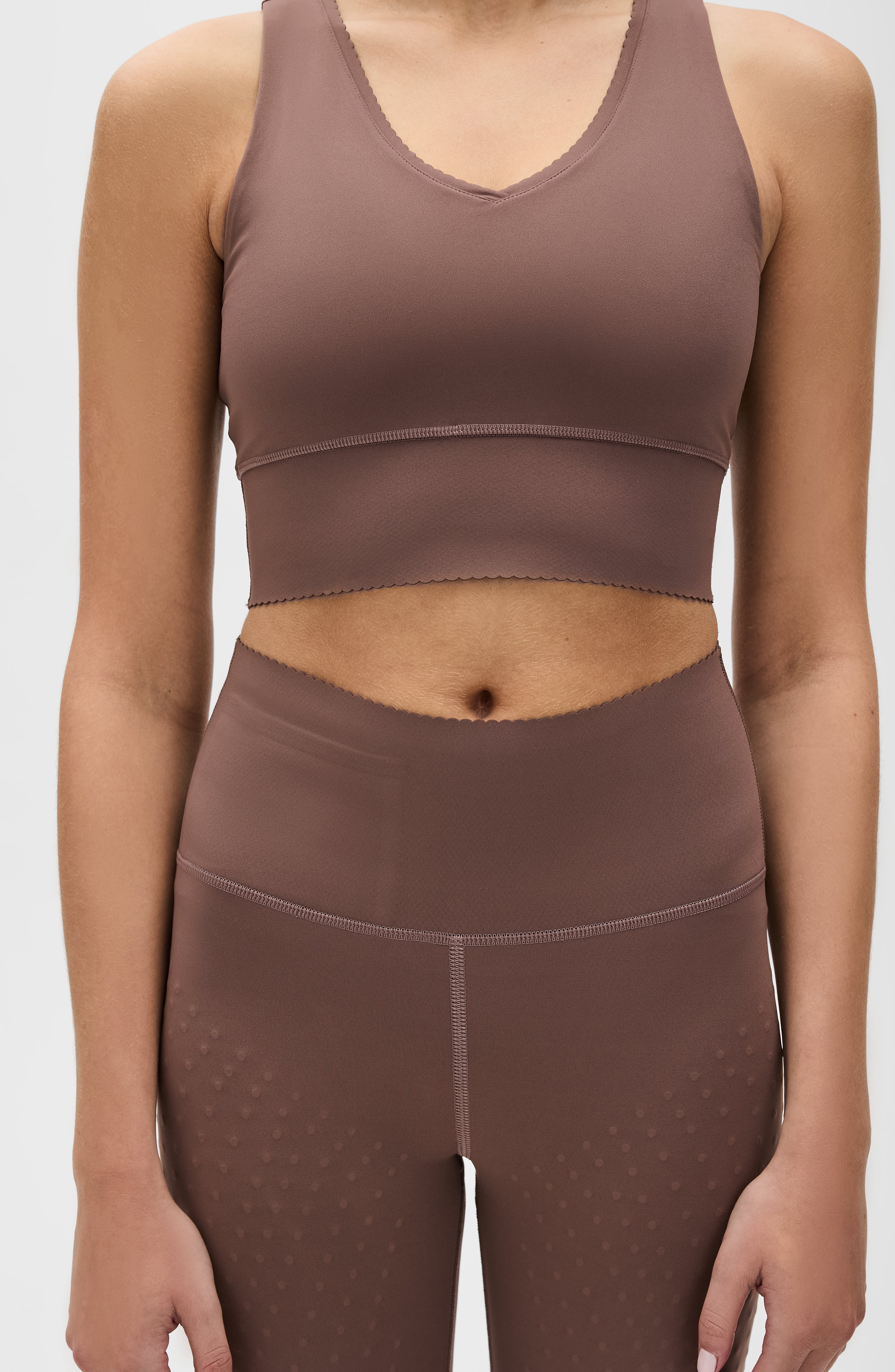 Adorn set in cappuccino color featuring an elegant scallop trim, made from OEKO-TEX® certified compression fabric with Elastique’s MicroPerle® technology to promote lymphatic drainage, boost circulation, reduce fatigue, and smooth the skin.