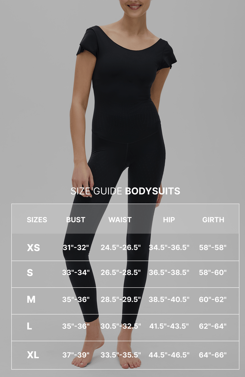 Le Cha-Cha jumpsuit in black featuring a sophisticated open back, delicate sleeve detailing, and a sleek, sculpting silhouette. Crafted from OEKO-TEX® certified compression fabric with Elastique’s MicroPerle® technology to promote lymphatic drainage, boost circulation, reduce fatigue, and enhance vitality.