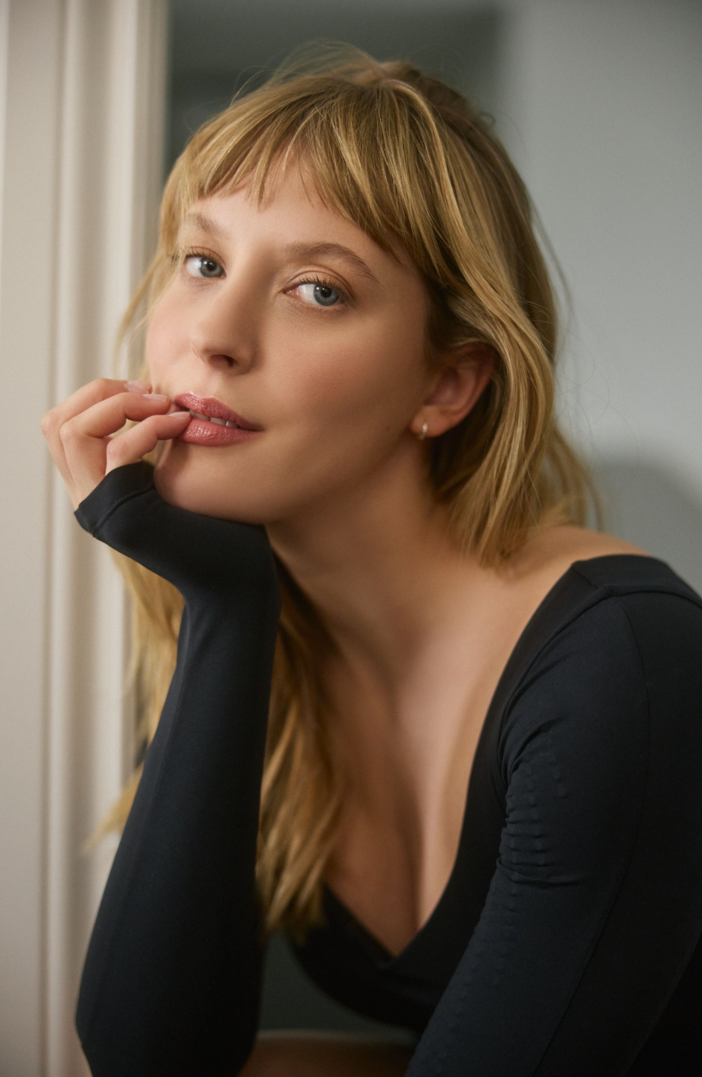 The Iconic Lymphatic Long Sleeve Bodysuit - Brief in black. Designed to enhance circulation, provide gentle compression, and sculpt effortlessly with OEKO-tex certified compression fabric, our MicroPerle® technology placed on the arms for lymphatic drainage, better circulation, reducing fatigue.