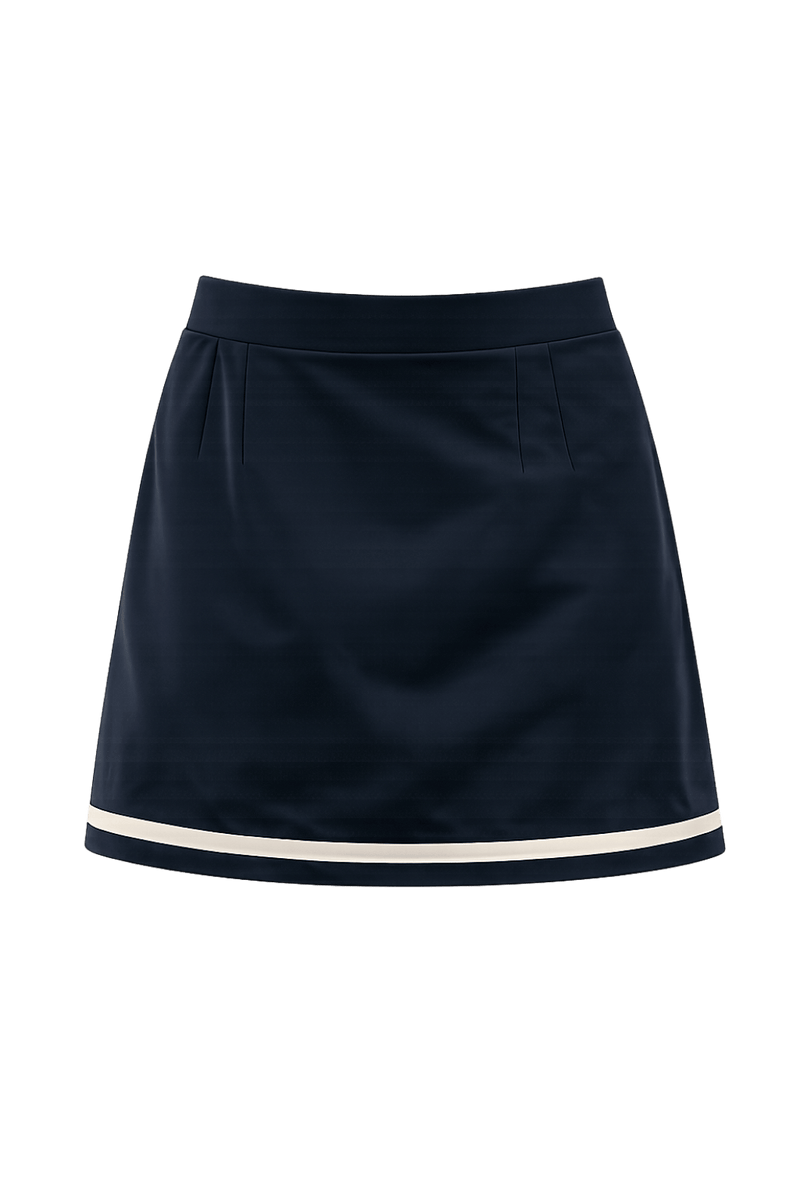 Ghost product image of the Monte Carlo navy and cream skort. This elegant resort-inspired silhouette features a flattering A-line shape, a comfortable waistband, and contrasting cream trim at the hem for a refined, timeless finish.
