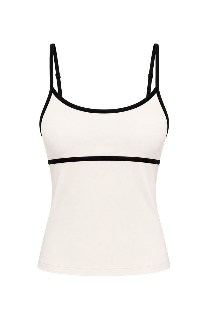 Ghost product image of the Monte Carlo cream and black tank. This elegant silhouette features adjustable straps, a rounded neckline, and contrasting black trim that highlights the design lines for a chic, timeless resort-inspired look.