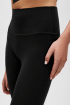 Adorn leggings in black featuring an elegant scallop trim, made from OEKO-TEX® certified compression fabric with Elastique’s MicroPerle® technology to promote lymphatic drainage, boost circulation, reduce fatigue, and smooth the skin.