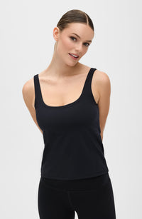 Lisse tank in black made from OEKO-TEX® certified compression fabric with a built-in bra designed to enhance circulation, reduce swelling and fatigue, and boost energy for all-day comfort and support.