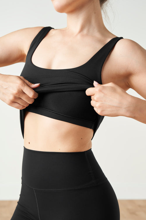 Load image 1 in gallery view. Lisse tank in black made from OEKO-TEX® certified compression fabric with a built-in bra designed to enhance circulation, reduce swelling and fatigue, and boost energy for all-day comfort and support.