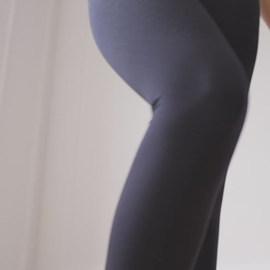 Model wearing L'Original Stirrup Leggings in black