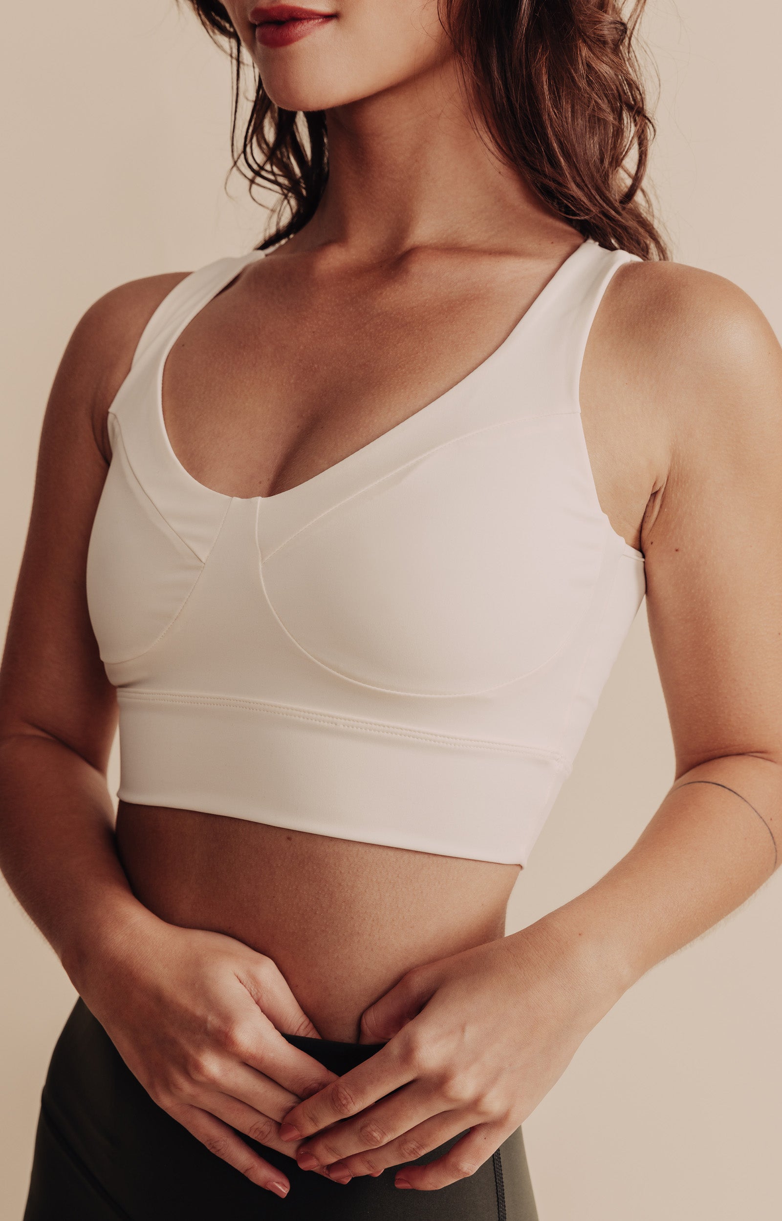 Model wearing Le Divine bra in ivory with MicroPerle on an oeko-tex compression fabric for better circulation, lymphatic drainage, pain relief